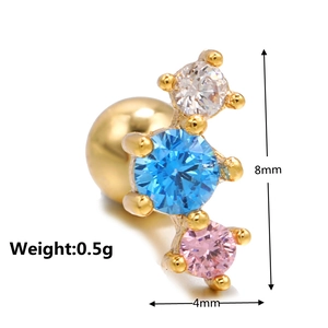 Detailed macro of a 20G stainless steel cartilage stud with triple colored zircons
