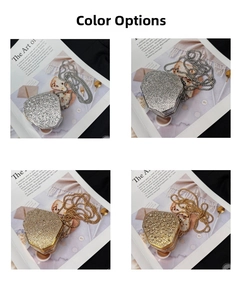 Macro view of crystal encrusted geometric mini evening bags with gold and silver chains