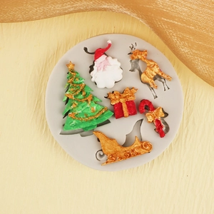Weihnachts Silikonform mit Weihnachtsmann, Rentier und Baum zum Backen von Fondant