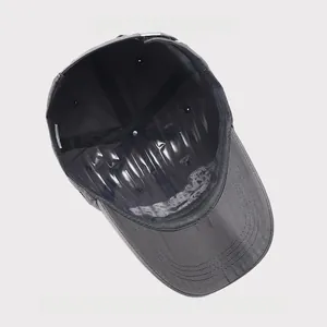 Detailed view of the dark grey cotton baseball cap interior and curved brim stitching