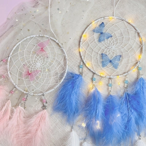 Handmade butterfly dreamcatcher with colorful feathers and LED lights home wall decor