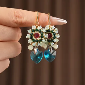 Vintage style handmade beaded earrings with blue heart crystal pendants for women