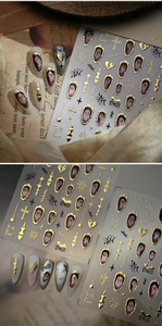 Detailed M-1220 Halloween nail decals featuring gold ghosts, bats, and crosses on nails