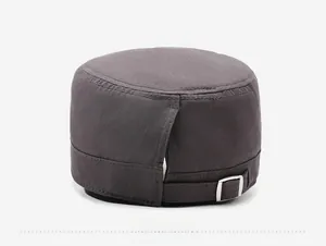 Detail of dark grey flat top cap with adjustable silver metal buckle on the back