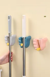 Space-saving wall-mounted mop holder with gravity roller design in multiple colors