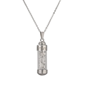 Detail of silver stainless steel perfume bottle pendant with white stones and Greek key pattern