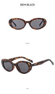 Detail of tortoise shell oval sunglasses featuring dual star metal accents on the temple