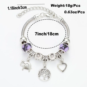 Silver and purple beaded bracelet with tree of life and elephant charms in 7-inch length