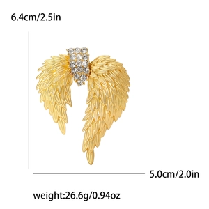 Golden enamel wing brooch with clear rhinestones including size and weight dimensions