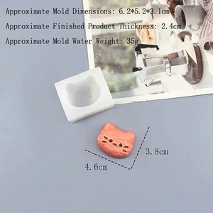 Detailed view of cat-shaped silicone mold with dimensions and pink finished DIY product