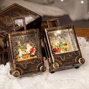 Vintage bronze suitcase Christmas lantern with Santa Claus and festive LED glitter effects