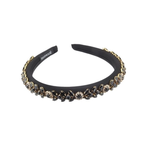 Baroque black velvet headband featuring handmade crystal rhinestones and gold metal base