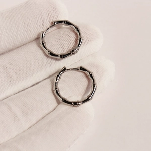 Elegant silver bamboo-style round hoop earrings for minimalist everyday wear