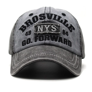 Detailed embroidery of BROSVILLE and NYS patch on washed grey cotton baseball cap
