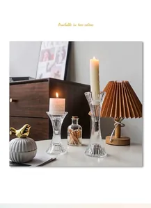 Detail of hourglass-shaped crystal glass candlesticks with vertical ribbed textures