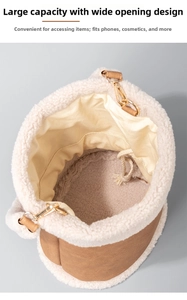 Detail view of khaki leather and beige plush bucket bag with spacious interior and drawstring