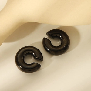 Minimalist C-shaped thick hoop earrings in polished black stainless steel finish