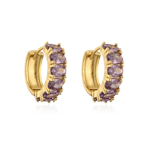 Detailed close-up of gold-plated hoop earrings with oval purple zircon gemstone inlays