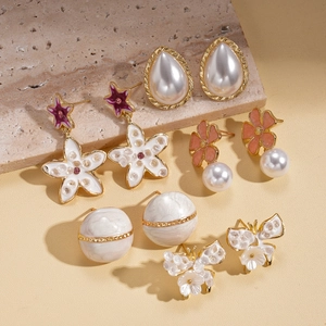 Elegant 10-piece earring set featuring pearls, enamel flowers, and rhinestones