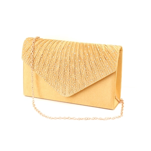 Golden satin evening clutch bag with sparkling rhinestones and a chain shoulder strap