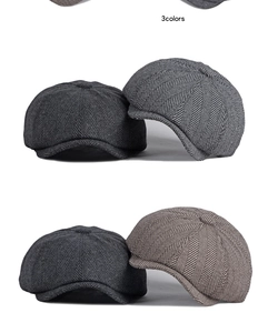 Detailed view of herringbone wool newsboy caps in three colors with classic vintage texture