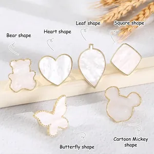 Japanese style resin shell nail art palette ring with gold rim edging and elegant shapes