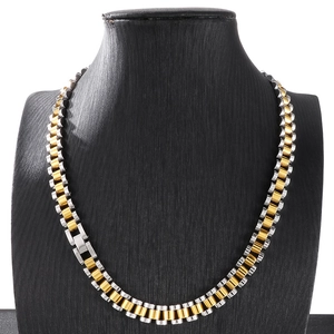 Detail of 10mm stainless steel watch strap style necklace in gold and silver finish