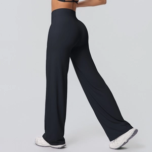 Detail of high waisted flare yoga pants showing peach lift seam and soft brushed fabric