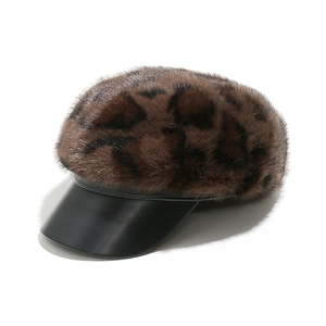 Detail of leopard print faux mink newsboy cap with black leather visor for autumn winter