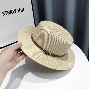 Flat top straw sun hat in light khaki with brown leather band and gold D-buckle detail