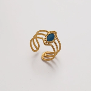 Detail of adjustable gold-plated ring with triple twisted texture and blue enamel inlay