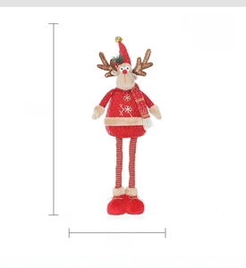 Detail of red and gold telescopic elk doll with 77cm height and snowflake knit sweater