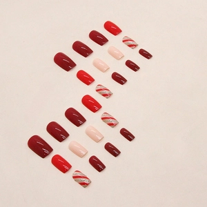 Glossy red and pink square press-on nails set with festive glitter stripes