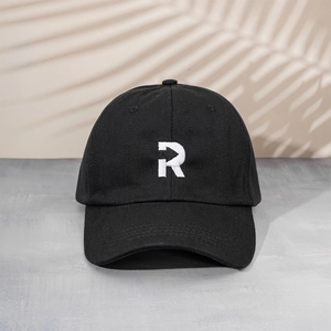 Classic black cotton baseball cap featuring a white embroidered letter R on front