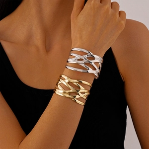 Crossed multilayer geometric open cuff bracelets in polished gold and silver finishes