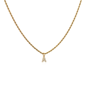Macro detail of 18K gold plated twist chain necklace with sparkling zircon letter A pendant