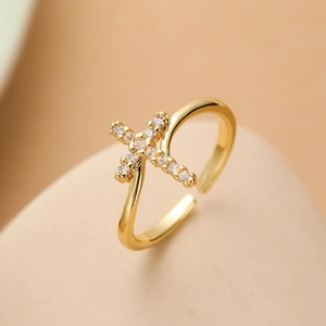 Gold-plated cross open ring for women with white zircon crystals in a minimalist design