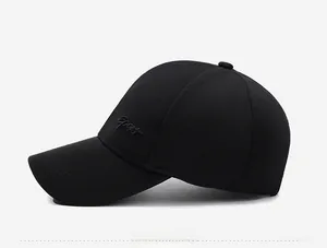 Detail view of the black sports baseball cap featuring professional side embroidery