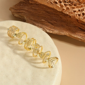Set of 8 gold-plated 14K adjustable star rings with cubic zirconia on stone base