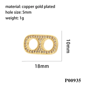 Detail of 18K gold plated copper oval connector with sparkling micro-inlaid stones