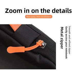 Close-up of black laptop sleeve with durable woven texture and orange zipper detail