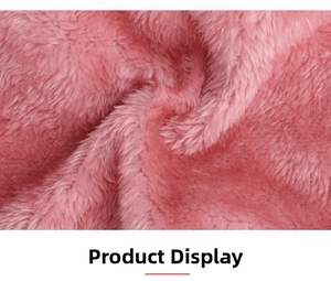 Macro detail of soft pink fleece lining showing thick plush texture for winter warmth