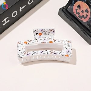 Medium square Halloween hair claw clip with colorful spooky patterns and magical prints