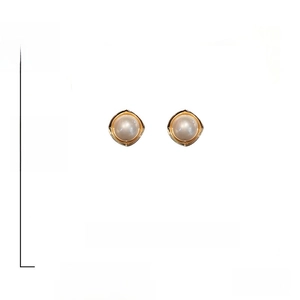 Macro shot of geometric pearl stud earrings showing 2.1cm dimensions and 925 silver needles