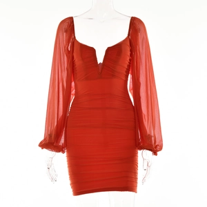 Detail of V-neck orange red mini dress with mesh lantern sleeves and ruched texture