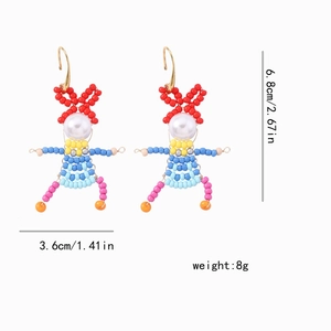 Detailed view of handmade beaded doll earrings with dimensions 6.8cm length and 8g weight