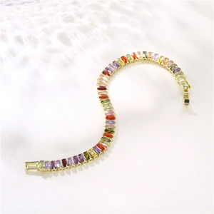 S-shaped curved gold-plated bracelet with colorful round-cut zircon stones