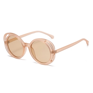 Chic oval hollow-out sunglasses with translucent nude pink resin frames and amber lenses