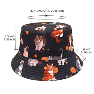 Reversible bucket hat for women featuring cute cartoon cat patterns and orange polka dots