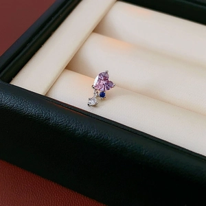 Detailed close-up of a silver heart stud earring with pink, blue, and clear zircon stones